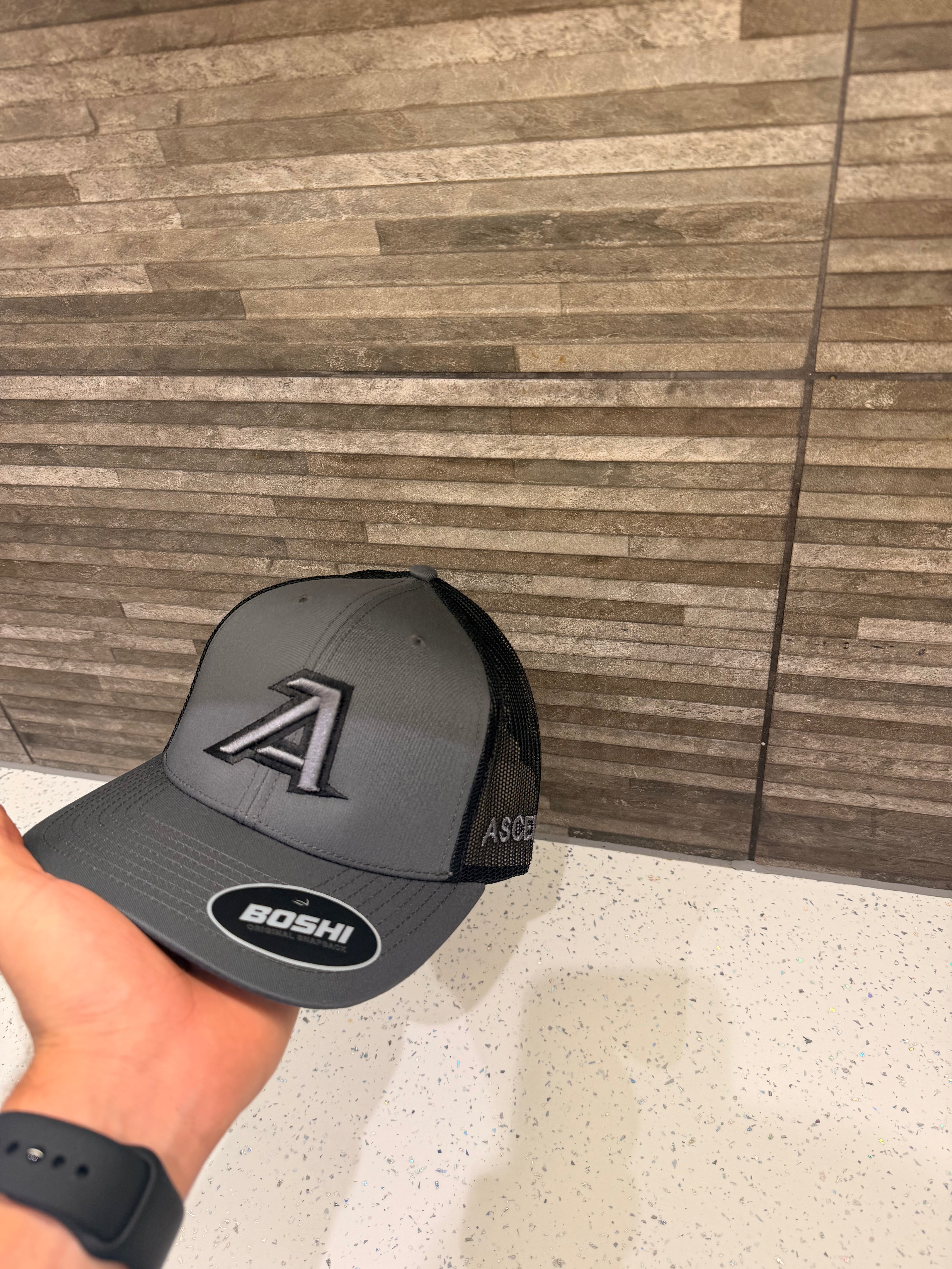 gray and black ascend cap